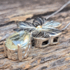 Dije Trebol Vista con Gema pera y aplique de oro 18k cuerpo de plata 925 con cadena www.pabloarielcanete.com
